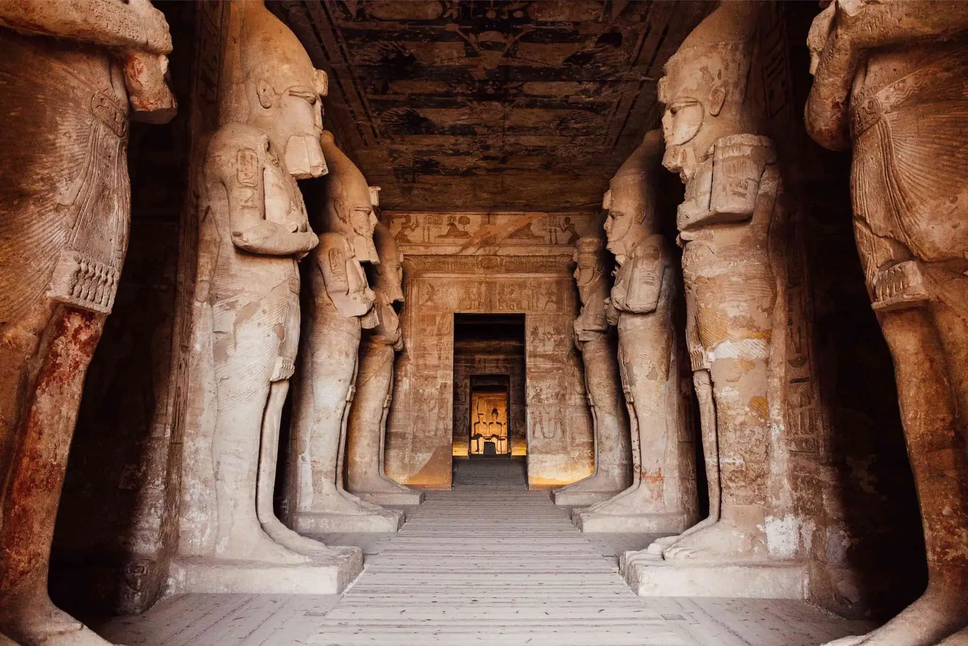 Colossal statues inside the rock-cut temple of Abu Simbel on a private Egyptologist-guided Egypt tour