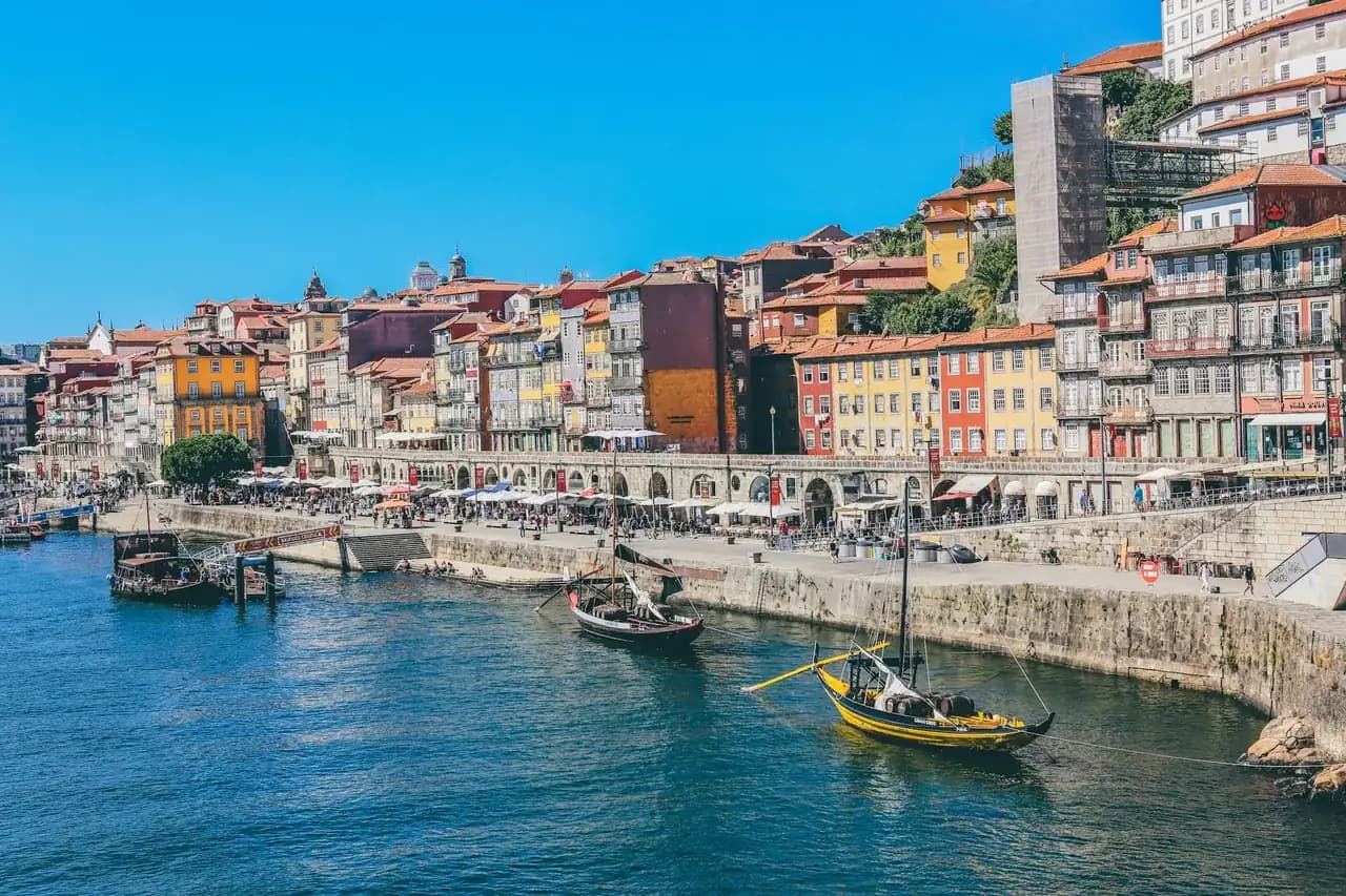 Colorful Ribeira houses along the Douro riverfront in Porto on a luxury Portugal tour