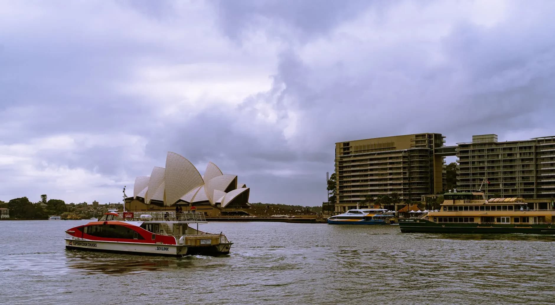 Sydney Opera House and harbor at dusk on a luxury Australia journey